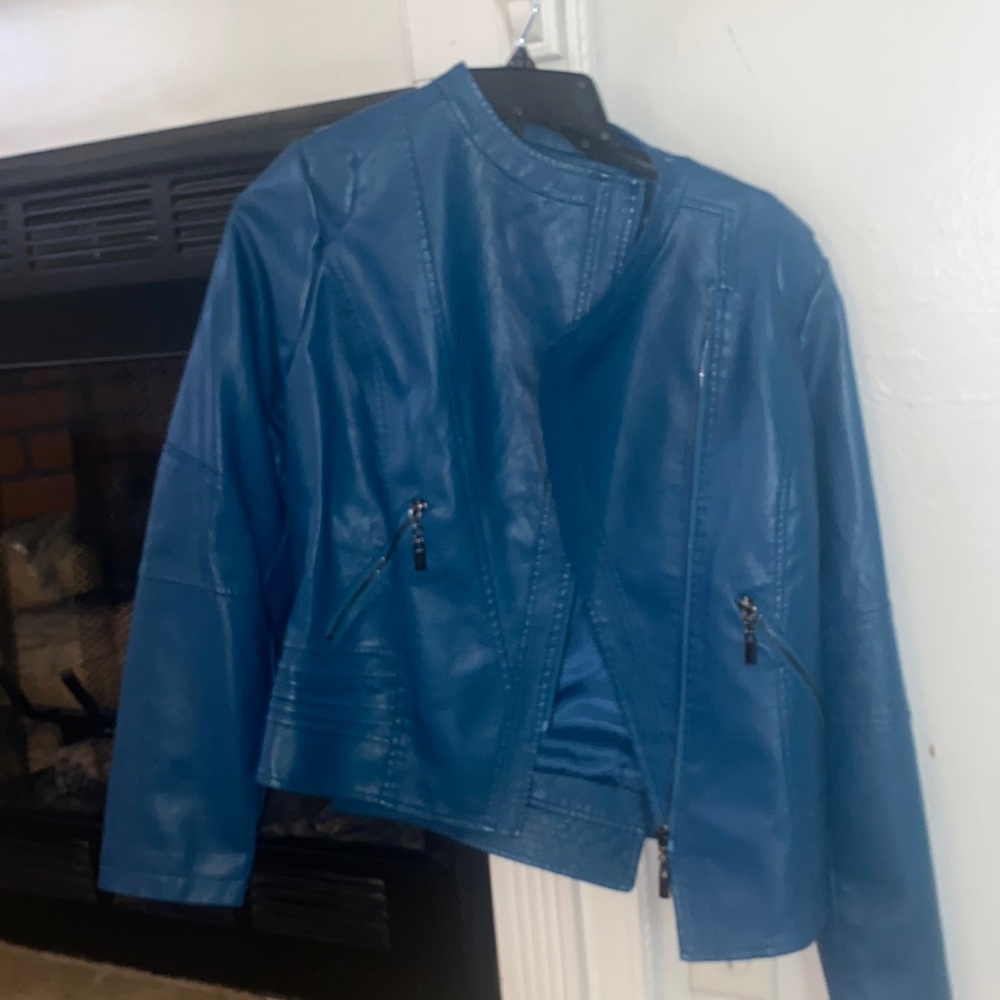 Women’s medium blue fake leather jacket.